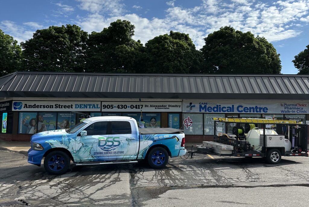 DSS truck and equipment trailer at a commercial plaza in Whitby, ON