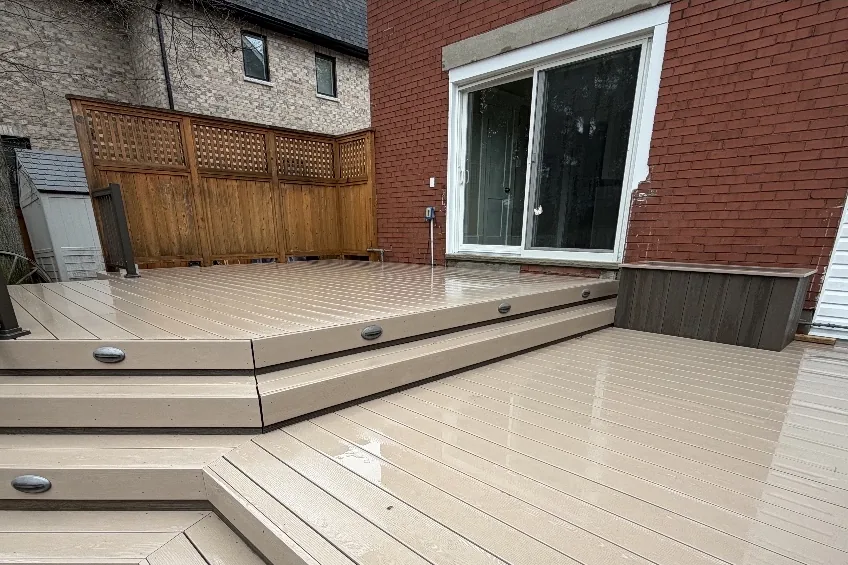 After: The same composite deck and stairs clean after a deck wash