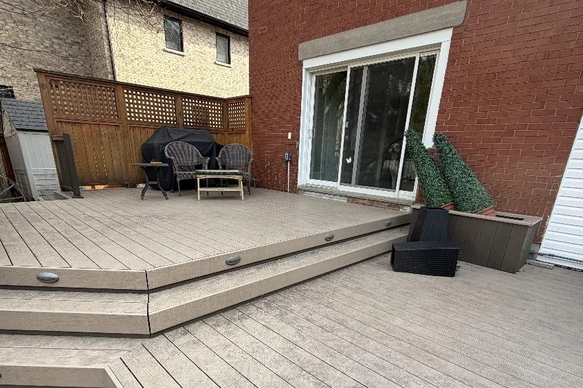 Before: Composite deck and stairs dull with dirt and grime
