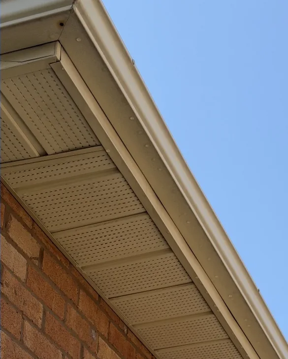 After: The same soffit and fascia clean after exterior cleaning